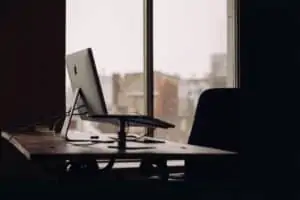 Laptop on stand on desk