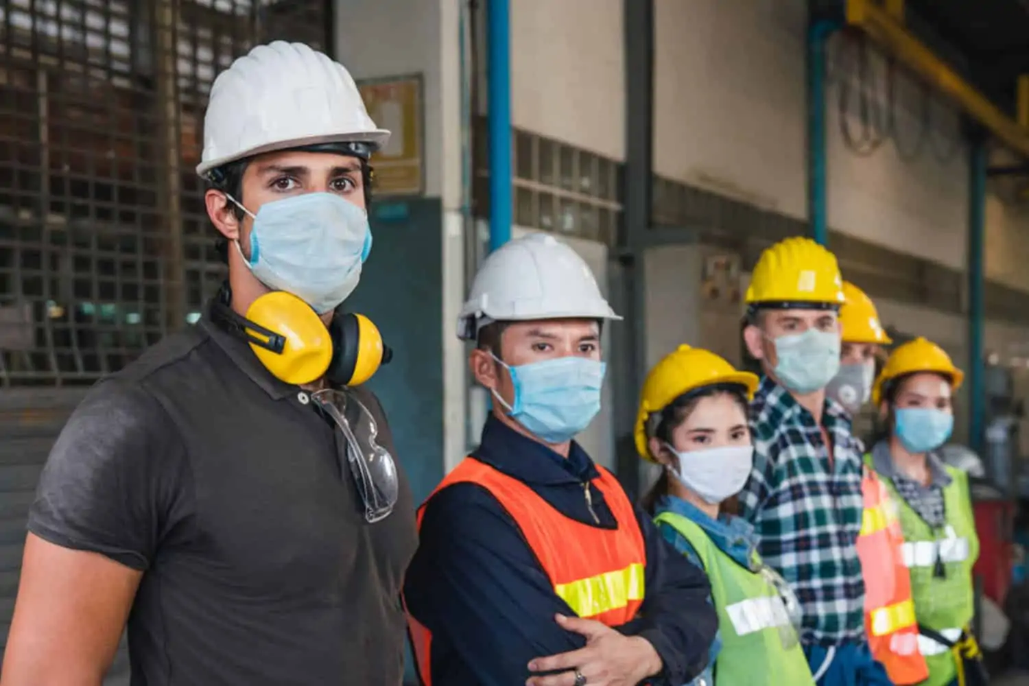 workers wearing masks demonstrating workplace rights